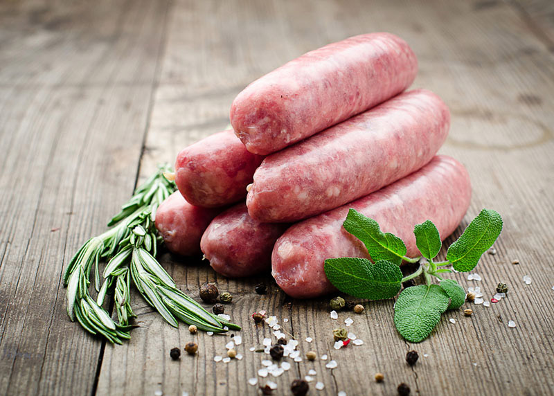 Pork Sausages with smokey bacon, rocket & garlic